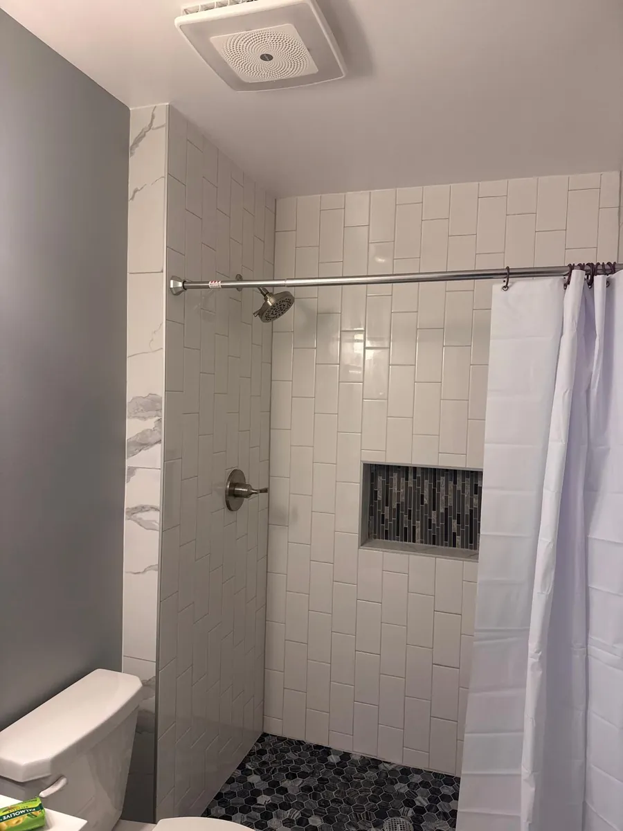 Subway tile shower, pebble pan — AS Home Solutions MD, Maryland