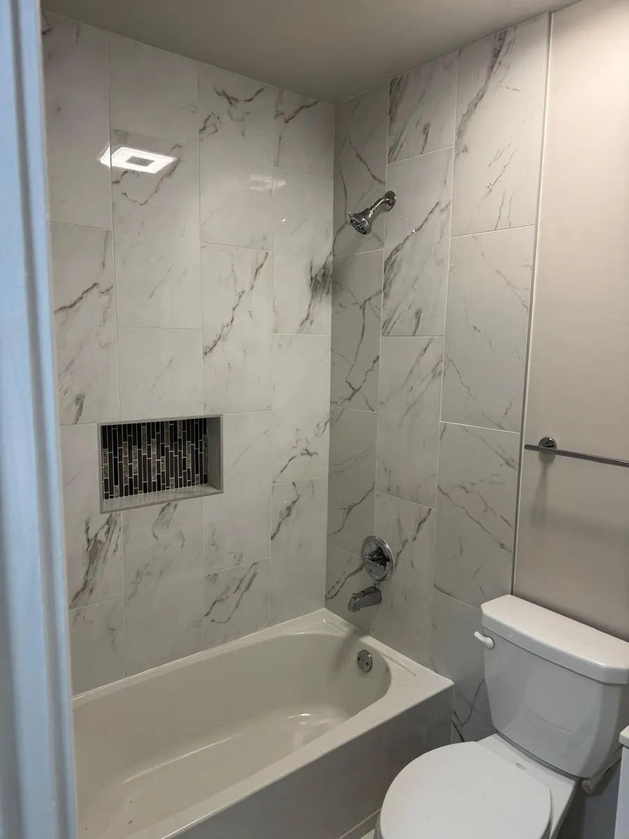 Tub surround tiled with a mosaic niche — AS Home Solutions MD, Maryland